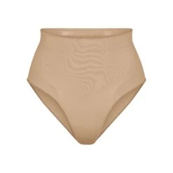 SEAMLESS SCULPT MID WAIST BRIEF | CLAY