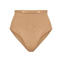 SEAMLESS SCULPT MID WAIST BRIEF | OCHRE
