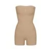 SEAMLESS SCULPT STRAPLESS SHORTIE BODYSUIT | CLAY