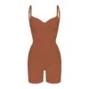 SEAMLESS SCULPT LOW BACK MID THIGH BODYSUIT | BRONZE
