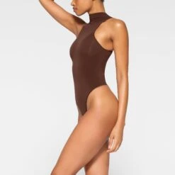 SEAMLESS SCULPT HIGH NECK THONG BODYSUIT | COCOA 9 SEAMLESS SCULPT HIGH NECK THONG BODYSUIT | COCOA -SWIMwear Sale Store SKIMS SHAPEWEAR BD THG 2905 JA COA 0009 SD
