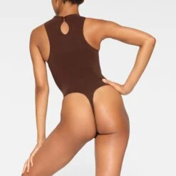SEAMLESS SCULPT HIGH NECK THONG BODYSUIT | COCOA 10 SEAMLESS SCULPT HIGH NECK THONG BODYSUIT | COCOA -SWIMwear Sale Store SKIMS SHAPEWEAR BD THG 2905 JA COA 0020 BK