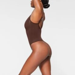 SEAMLESS SCULPT THONG BODYSUIT | COCOA 9 SEAMLESS SCULPT THONG BODYSUIT | COCOA -SWIMwear Sale Store SKIMS SHAPEWEAR BD THG 3369 IB COA 0017 SD
