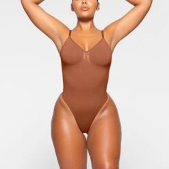 SEAMLESS SCULPT LOW BACK THONG BODYSUIT | BRONZE -SWIMwear Sale Store SKIMS SHAPEWEAR BD THG 3371 KA BRZ 0003 FR 6f47f275 1421 4f61 bfe7 9f80688b0f8a