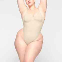 SEAMLESS SCULPT LOW BACK THONG BODYSUIT | SAND -SWIMwear Sale Store SKIMS SHAPEWEAR BD THG 3371 KC SND 0004 FR