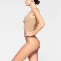 SEAMLESS SCULPT LOW BACK THONG BODYSUIT | CLAY 11 SEAMLESS SCULPT LOW BACK THONG BODYSUIT | CLAY -SWIMwear Sale Store SKIMS SHAPEWEAR BD THG 3371 KD CLY 0008 SD