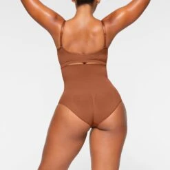 SEAMLESS SCULPT HIGH-WAISTED BRIEF | BRONZE 10 SEAMLESS SCULPT HIGH-WAISTED BRIEF | BRONZE -SWIMwear Sale Store SKIMS SHAPEWEAR PN BRF 3361 IA BRZ 0014 BK