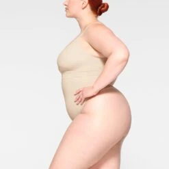 EVERYDAY SCULPT HIGH-WAISTED THONG | SAND -SWIMwear Sale Store SKIMS SHAPEWEAR PN THG 3150 JB SND 0010 SD 2816cba2 44d1 4991 9614 a074faa19a53