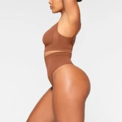 SEAMLESS SCULPT MID WAIST THONG | BRONZE 9 SEAMLESS SCULPT MID WAIST THONG | BRONZE -SWIMwear Sale Store SKIMS SHAPEWEAR PN THG 3358 IA BRZ 0018 SD