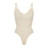 SEAMLESS SCULPT THONG BODYSUIT | SAND