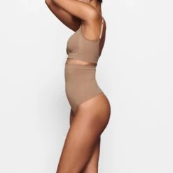 SEAMLESS SCULPT HIGH-WAISTED THONG | SIENNA 9 SEAMLESS SCULPT HIGH-WAISTED THONG | SIENNA -SWIMwear Sale Store SKIMS SHAPEWEAR SH HWT 0119 MA SIE SD f223a924 24d6 42a4 a2ad 8cbf1ae58a66