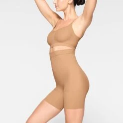 EVERYDAY SCULPT HIGH-WAISTED MID THIGH SHORT | OCHRE -SWIMwear Sale Store SKIMS SHAPEWEAR SH SHO 2152 JC OCH 0009 SD d643a0d3 c3a7 475a ba1b b00ce7cc65e8