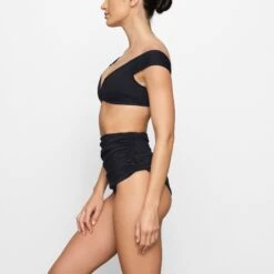 SHAPING SWIM OFF THE SHOULDER BIKINI TOP | ONYX -SWIMwear Sale Store SKIMS SWIM BT PLG 2788 FD ONX 0006 SD x2 23209a9b 04d1 460a ad6b 07bb42ec23ae