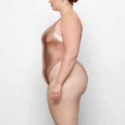 METALLIC SWIM HIGH CUT ONE PIECE | CHAMPAGNE -SWIMwear Sale Store SKIMS SWIM SW HICO 0035 QC CHP 0005 SD