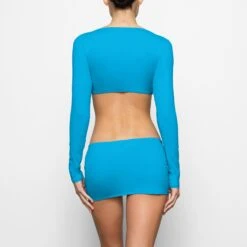 SWIM LONG SLEEVE SHRUG | TURQUOISE 10 SWIM LONG SLEEVE SHRUG | TURQUOISE -SWIMwear Sale Store SKIMS SWIM SW LGS 0015 CD TRQ 0018 BK