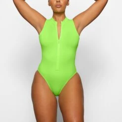 SWIM ZIP FRONT SLEEVELESS ONE PIECE | NEON GREEN 12 SWIM ZIP FRONT SLEEVELESS ONE PIECE | NEON GREEN -SWIMwear Sale Store SKIMS SWIM SW SLO 0149 CA NGE 0008 FR