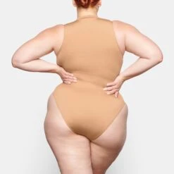 SWIM ZIP FRONT SLEEVELESS ONE PIECE | OCHRE 11 SWIM ZIP FRONT SLEEVELESS ONE PIECE | OCHRE -SWIMwear Sale Store SKIMS SWIM SW SLO 0149 TB OCH 0013 BK