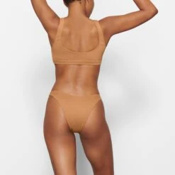 SWIM CHEEKY TANGA BOTTOMS | ALMOND -SWIMwear Sale Store SKIMS SWIM SW TAN 0783 MM ALM BK