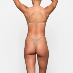 GLITTER SWIM STRING THONG | SIENNA -SWIMwear Sale Store SKIMS SWIM SW THG 0112 SIE ZC 0026 BK x1 fbf7ea0f 94f9 4c23 a556 d506b893668a